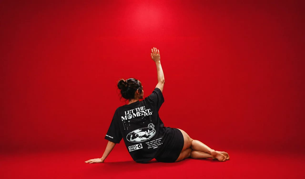Slugsera’s red campaign with a model wearing its graphic T-shirt